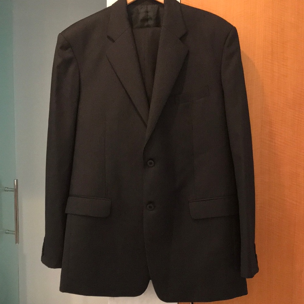 Custom made black pin striped suit